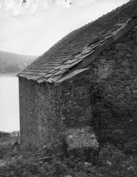 This picture shows the building that was originally used to house the safety boat. This building later collapsed and the other building was then converted to become the clubhouse.